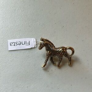 Finesta gold zebra brooch